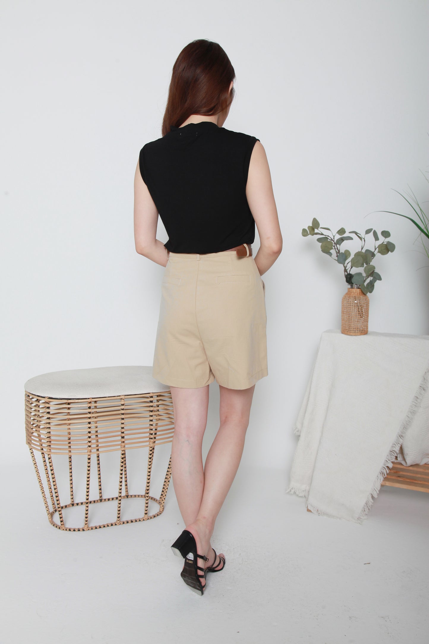 higher neckline Sleeveless top
