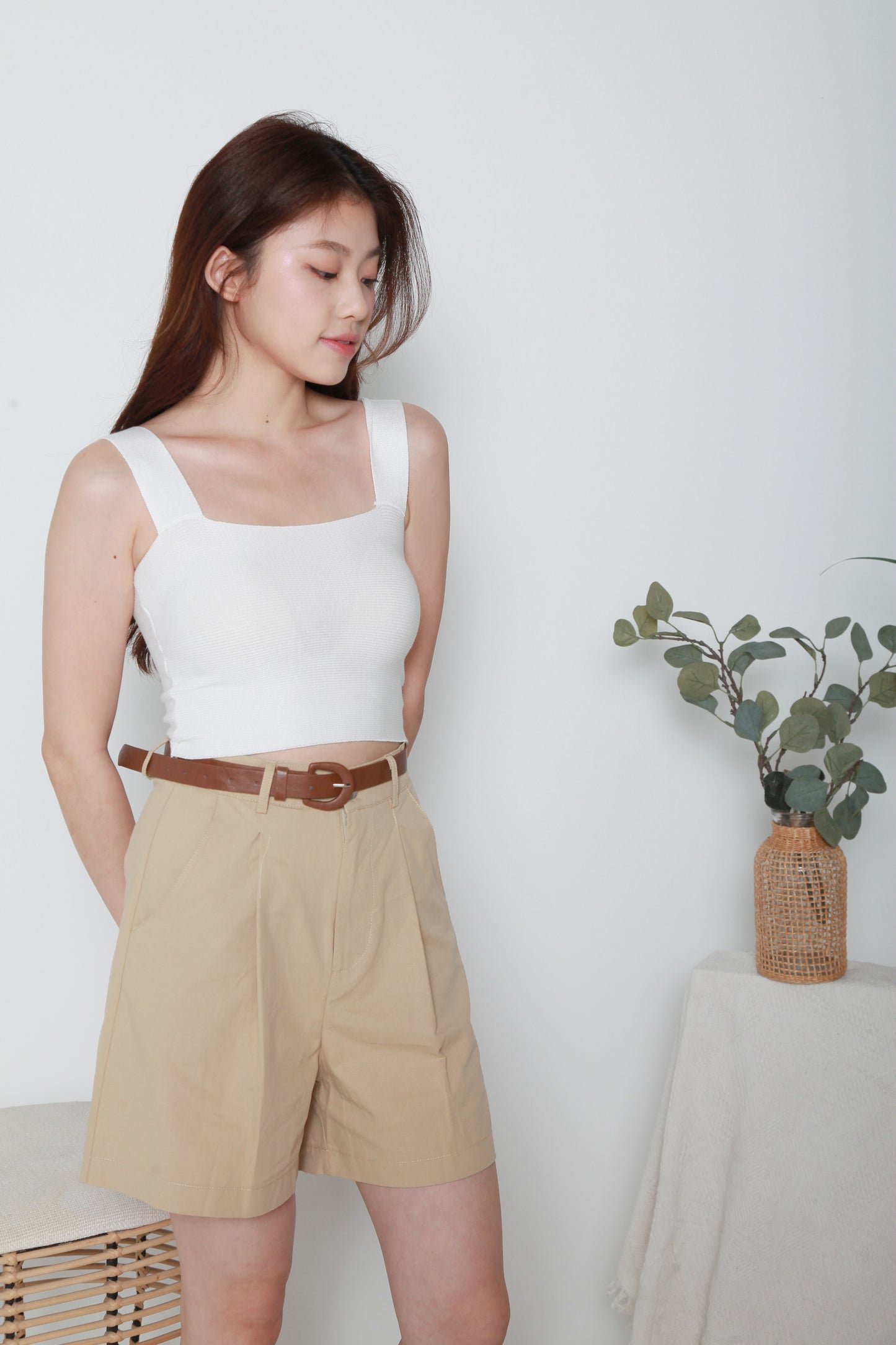 brown straight cut cotton shorts with belt.