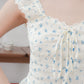 Hazel floral flutter sleeve top (cream)