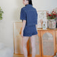 Nora Dark denim button crop top with high-waisted denim shorts