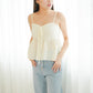 Chantria Ruffle Sleeveless Top (Champagne)