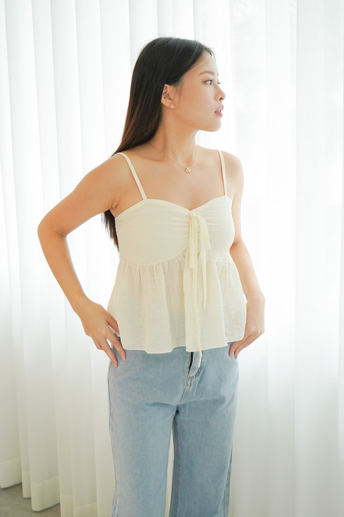 Chantria Ruffle Sleeveless Top (Champagne)