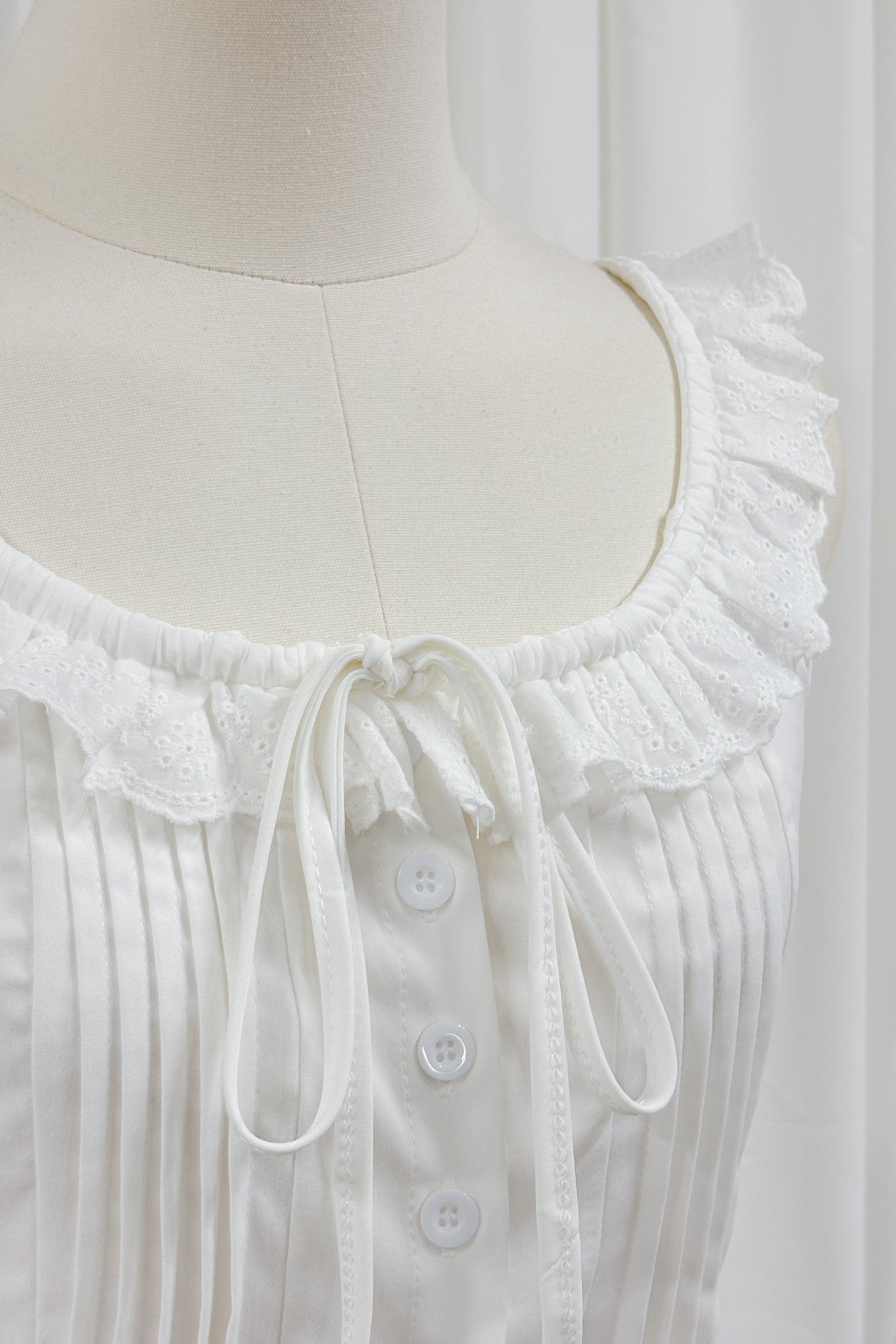 Julia white sleeveless eyelet lace ruffle trim blouse