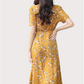 Swirl around in this graceful wrap dress
