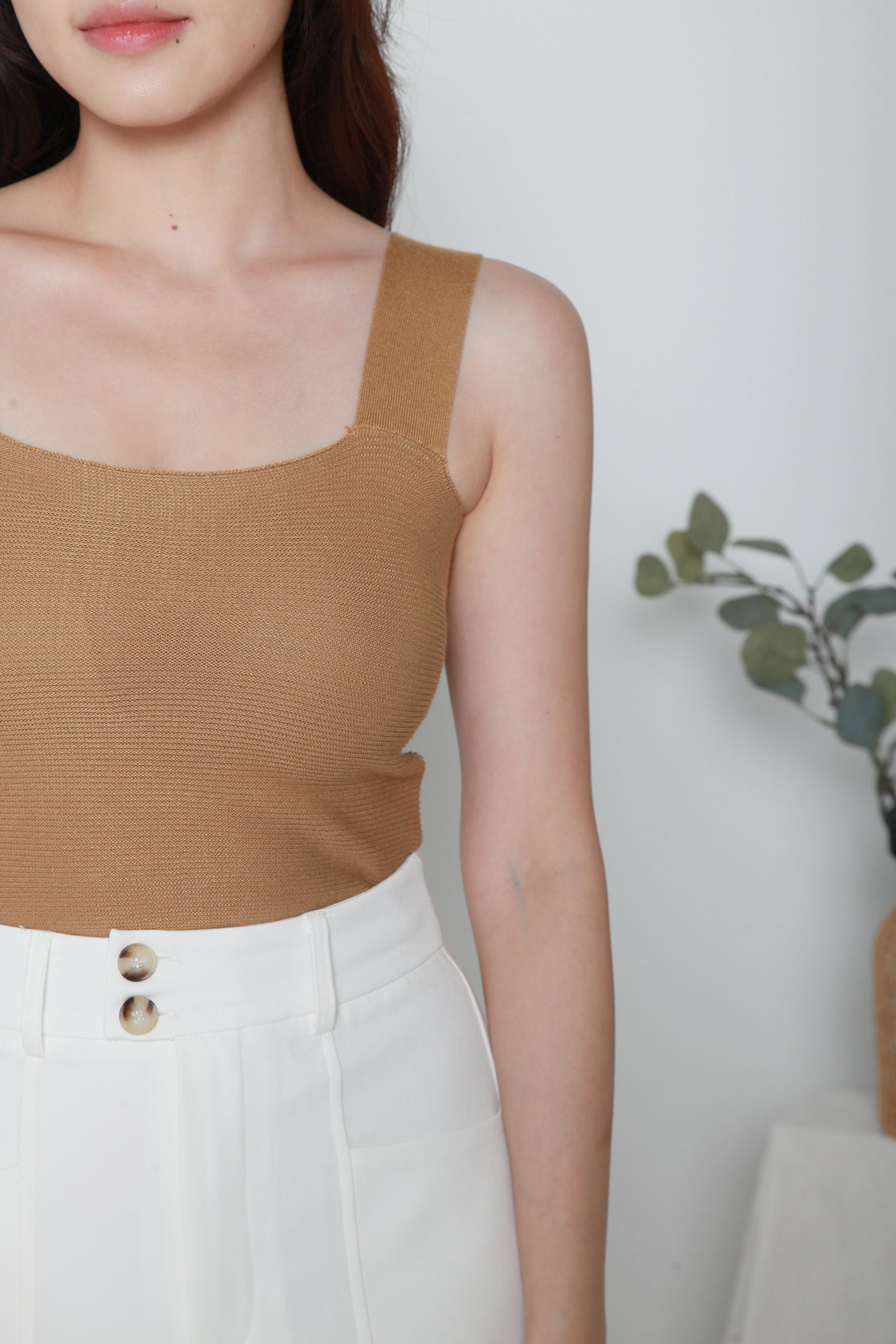 Ribbed top is designed with a square neckline